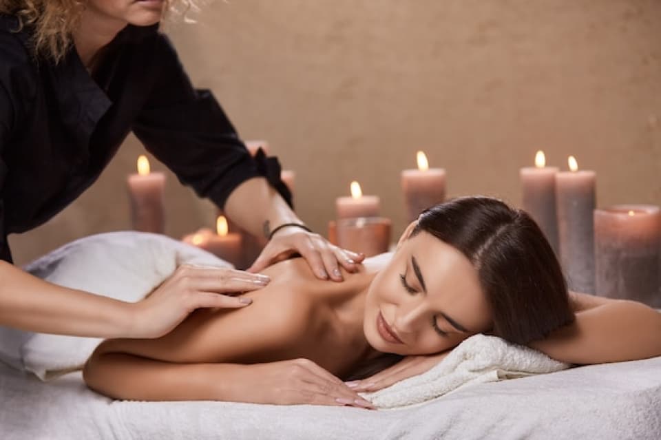 Professional deep tissue massage therapy session at a luxury spa